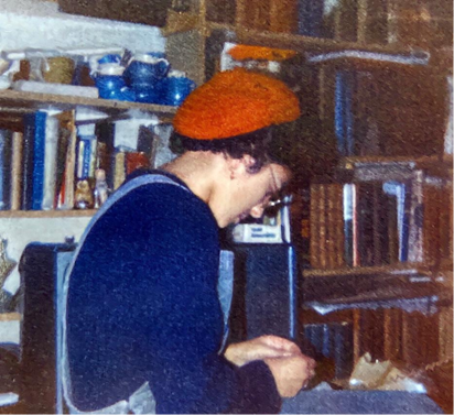 A female student in the 1980s wearing a red beret