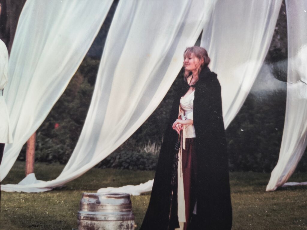 A student performing in an outdoor play