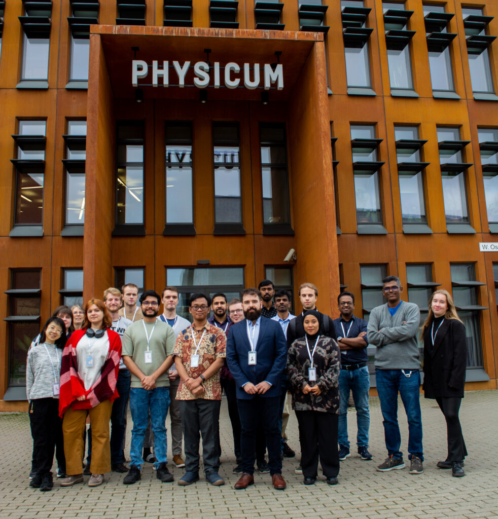 Andrei and a group of fellow students pose for a photo at the University of Tartu 