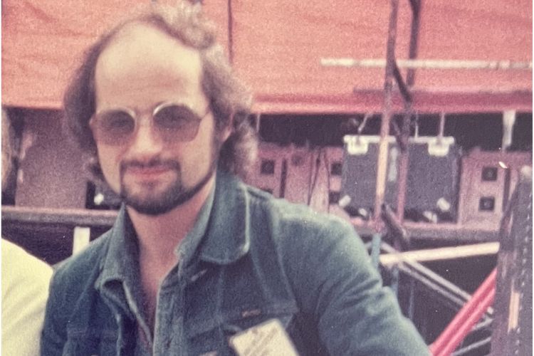 A 1978 photograph of Marshall Bissett wearing sunglasses on the Bob Dylan and Eric Clapton tour