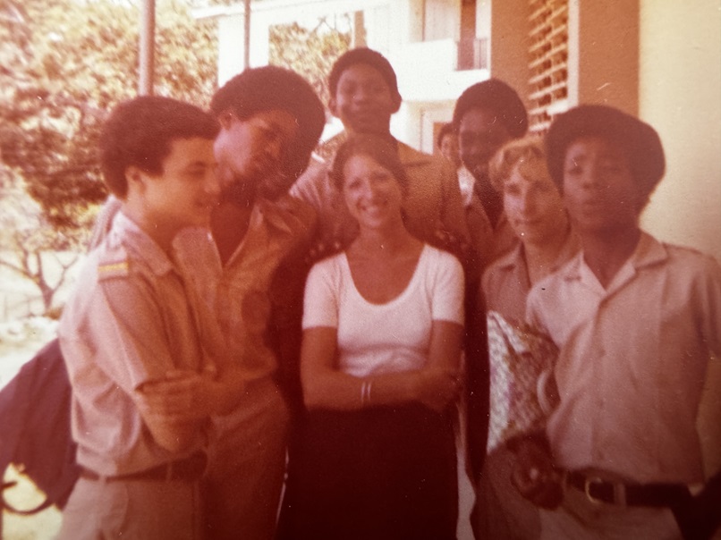 Liz Gerschel, a female teacher, pictured with sixth form students at a boys' college in Jamaica