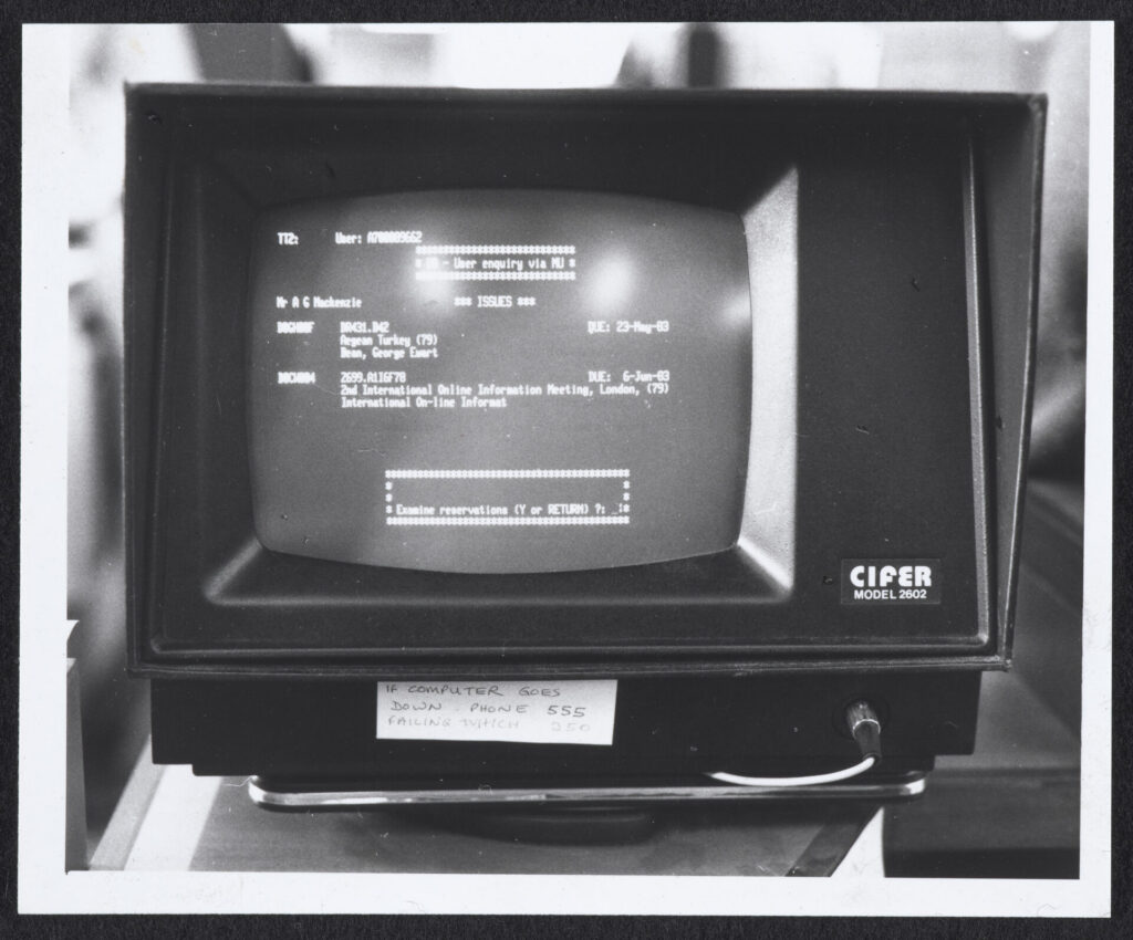 Black-and-white photograph of a Circon computer terminal displaying an early online library catalogue record