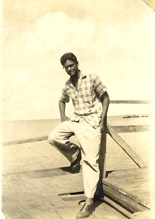 A 1960s black and white portrait of a young man from Trinidad and Tobago
