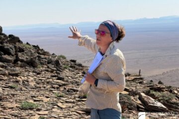 Geologist Catherine Rose, pictured in a remote area of Namibia in 2026